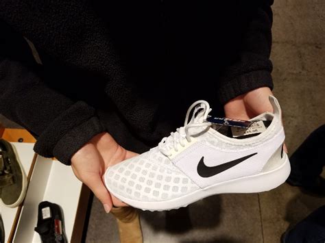 white Nike's with black swoosh